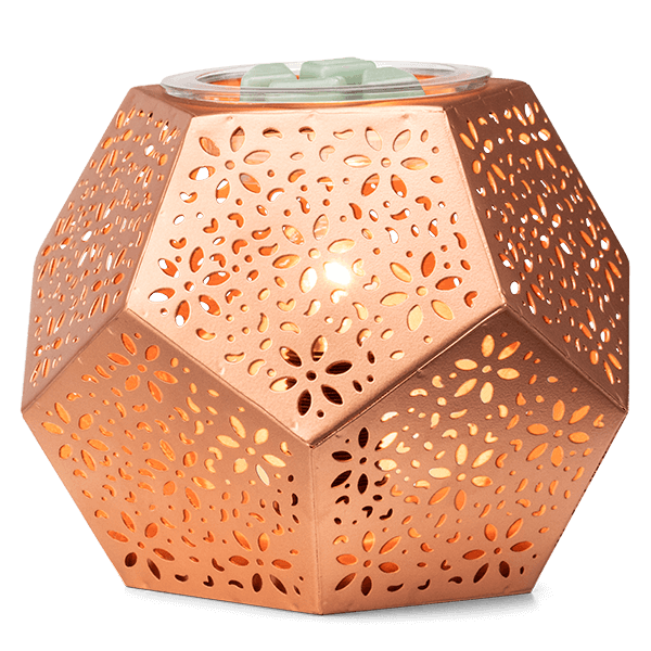 Copper Cast Scentsy Warmer with wax in dish and lights on