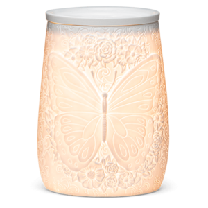 Flight of the Monarch Scentsy Warmer lit up and glowing.