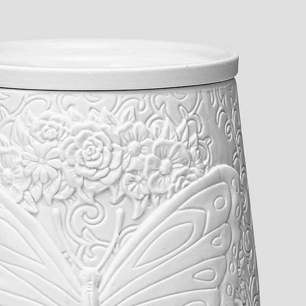 Flight of the Monarch Scentsy Warmer closeup showing the fine details of the etched design, warmer is turned off.