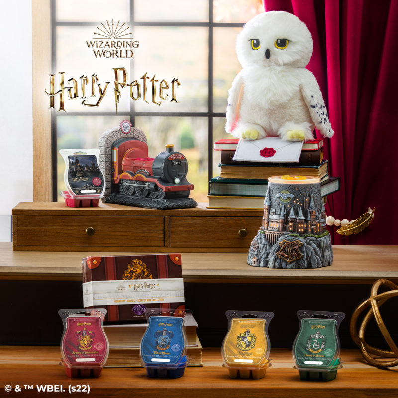 Harry Potter Wizarding World, Hedwig Owl Scentsy Buddy, Hogwarts Scentsy Warmer, Platform 9 3/4 Warmer, Hogwarts Houses Wax Collection in decorative box. Griffindor, Hufflepuff, Ravenclaw, Slytherin and Wizarding World Scentsy Bars on display.